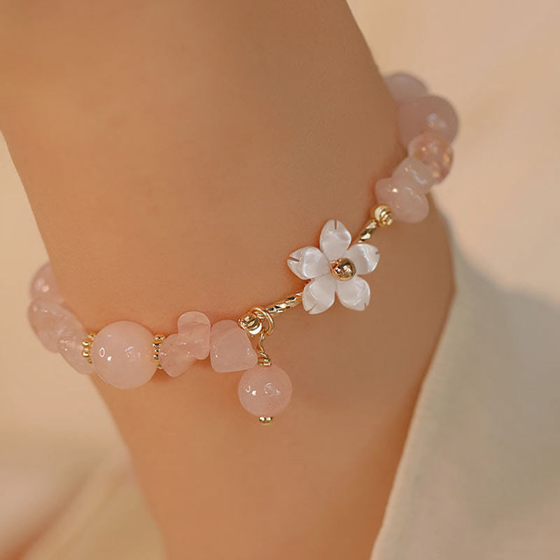 Pulsera de amor con flor de cristal rosa natural chapada en oro de 14 quilates con Buddha Stones