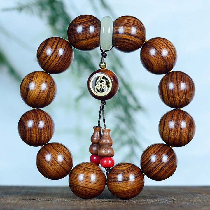 Pulsera con dije de Buddha Stones, palisandro, calidez, calma