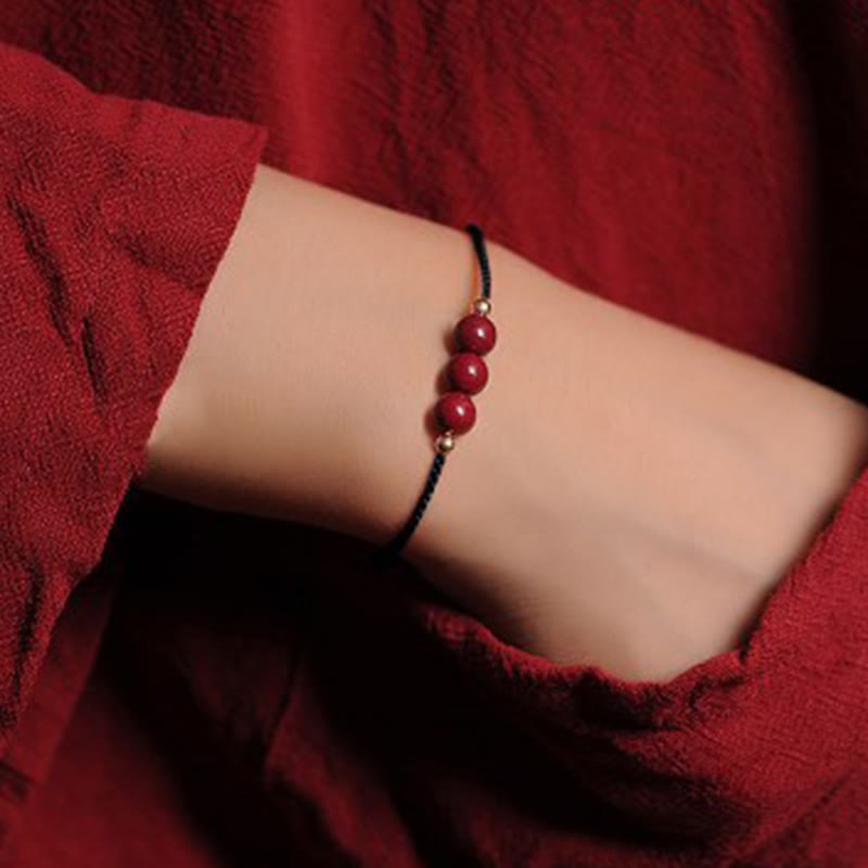 Pulsera trenzada con cadena de bendición de cinabrio natural chapada en oro de 14 quilates con Buddha Stones