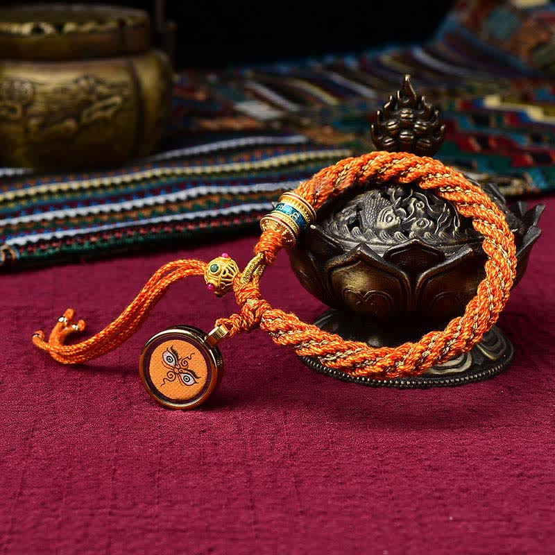 Pulsera de cuerda tejida con dije de rueda de oración Thangka de la suerte hecha a mano tibetana con Buddha Stones
