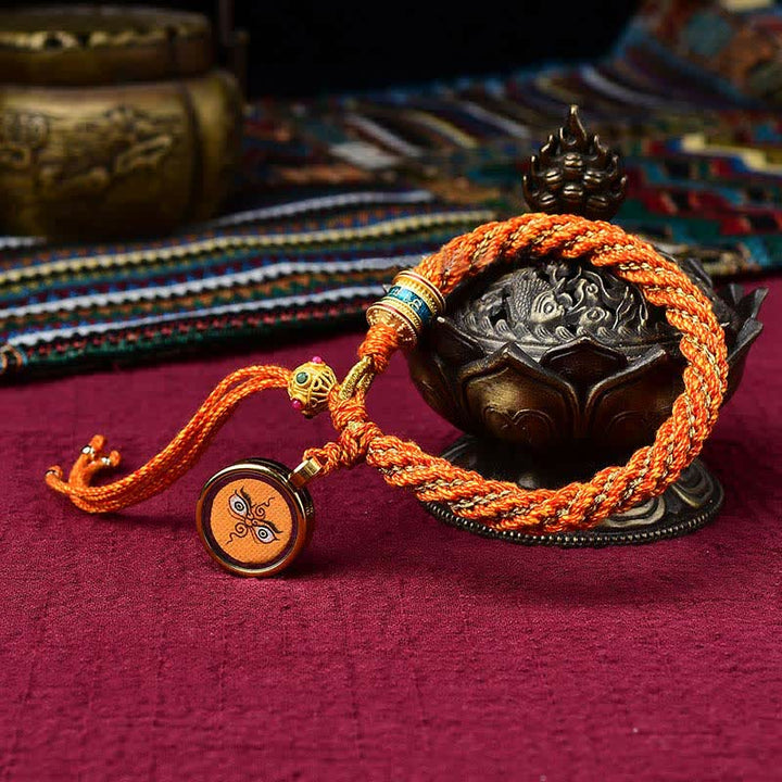 Pulsera de cuerda tejida con dije de rueda de oración Thangka de la suerte hecha a mano tibetana con Buddha Stones