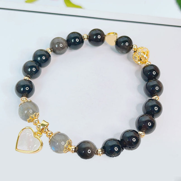 Pulsera de protección de flor de estrella de corazón de amor de obsidiana con brillo de plata natural de Buddha Stones