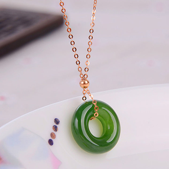 Colgante de collar de oro de 14 quilates curativo de jade cian redondo