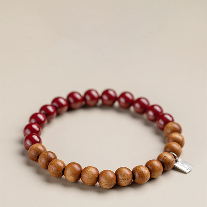 Pulsera de cinabrio de madera de melocotón de plata de ley 925 con Buddha Stones para protegerse de los malos espíritus