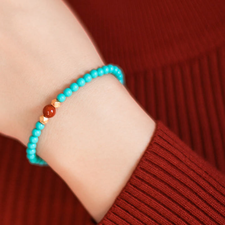 Pulsera de protección con cuentas de ágata roja turquesa de Buddha Stones
