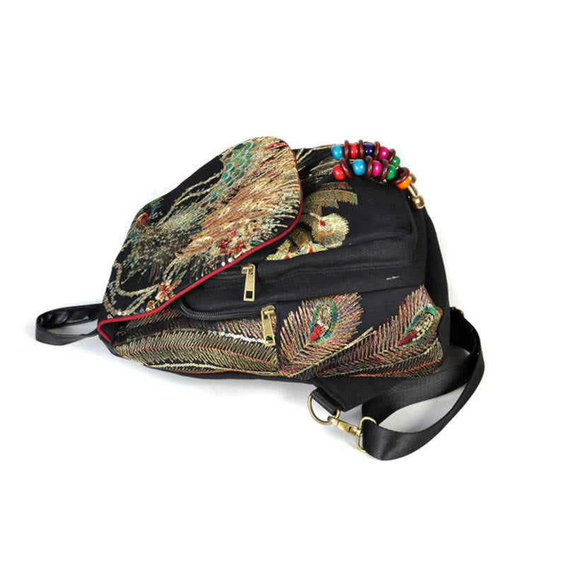 Mochila con borlas de lona con bordado de pavo real