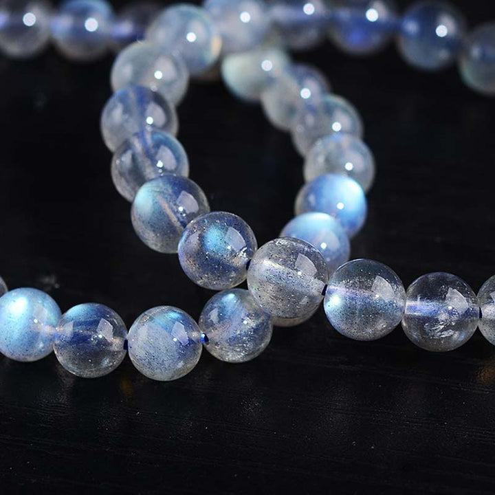Pulsera de cuentas curativas de piedra lunar natural de piedras de Buddha Stones - image 12