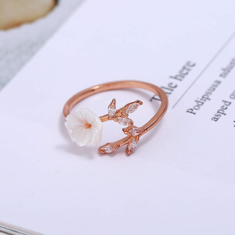 Anillo de la suerte de cobre con diseño de hojas de flor de ciruelo y Buddha Stones