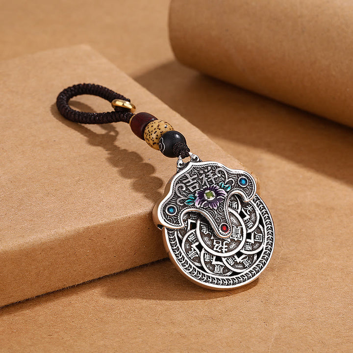Llavero de riqueza auspiciosa con moneda de cobre y flor de peonía con Buddha Stones