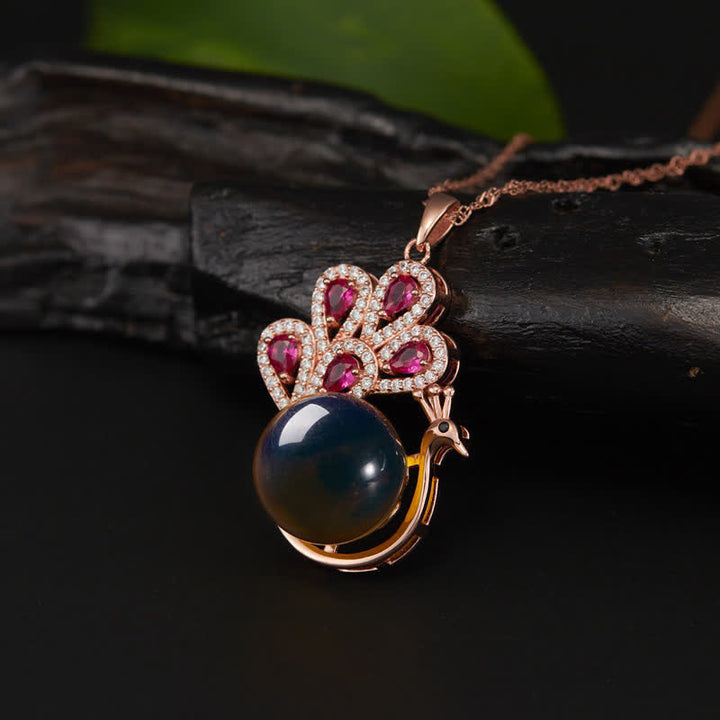 Anillo con colgante de collar de amor de fortuna de ámbar de pavo real