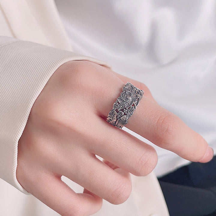 Anillo de prosperidad de flor de loto con pez koi de plata de ley 925 con Buddha Stones
