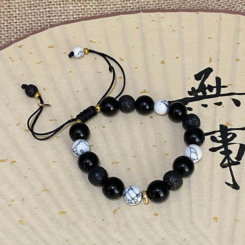 Pulsera de fuerza Yin Yang de piedra de roca de lava de obsidiana negra con Buddha Stones - image 11
