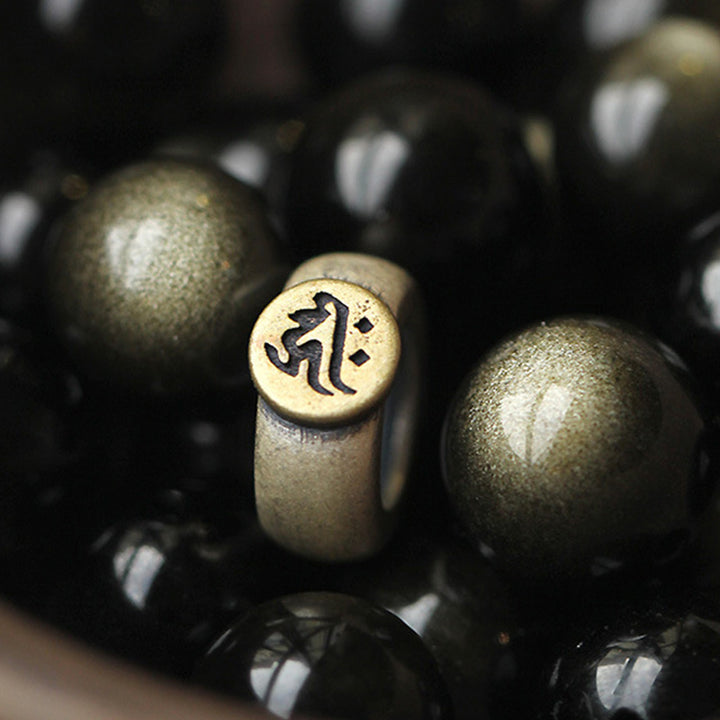 Pulsera de purificación de obsidiana de Buda natal del zodiaco chino de Buddha Stones