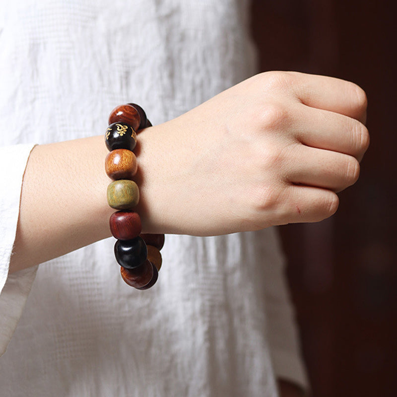 Pulsera de pureza Om Mani Padme Hum de varias maderas del Tíbet con Buddha Stones