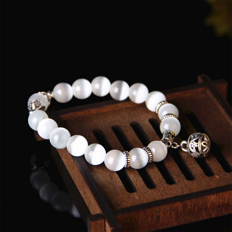 Pulsera de la suerte con ojo de gato tibetano y Buddha Stones