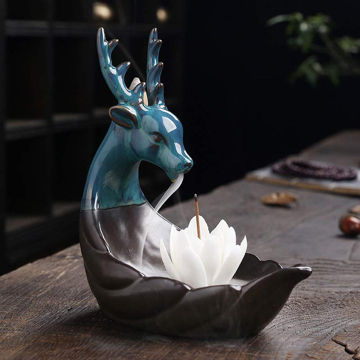 Quemador de incienso de meditación de loto de cerámica con pequeños ciervos de piedras de Buddha Stones , decoración