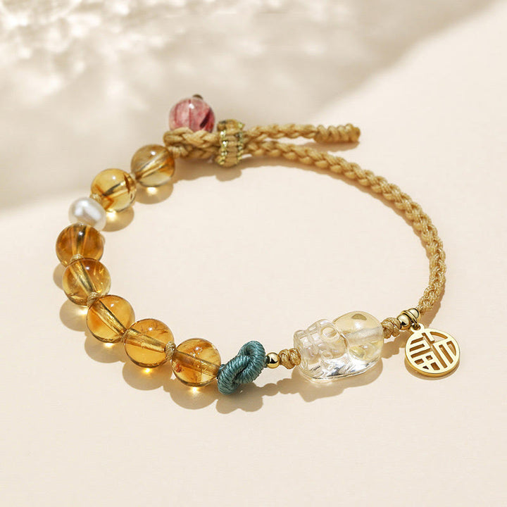 Pulsera trenzada de cuerda de prosperidad con carácter de citrino PiXiu Fu de Buddha Stones