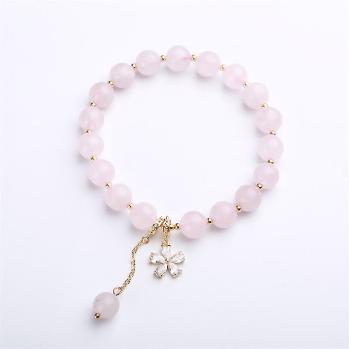 Pulsera de amor de flor de ciruelo de cristal rosa natural