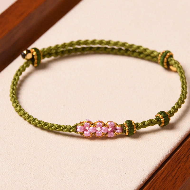 Pulsera de cuerda trenzada con protección de flor de melocotón hecha a mano con Buddha Stones