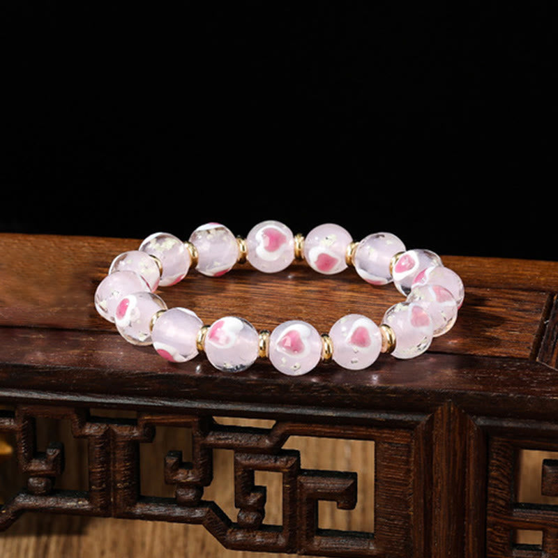 Pulsera de cuentas de cristal Liuli fluorescente luminosa con corazón de amor rosa de la familia de las bestias que tragan oro con Buddha Stones