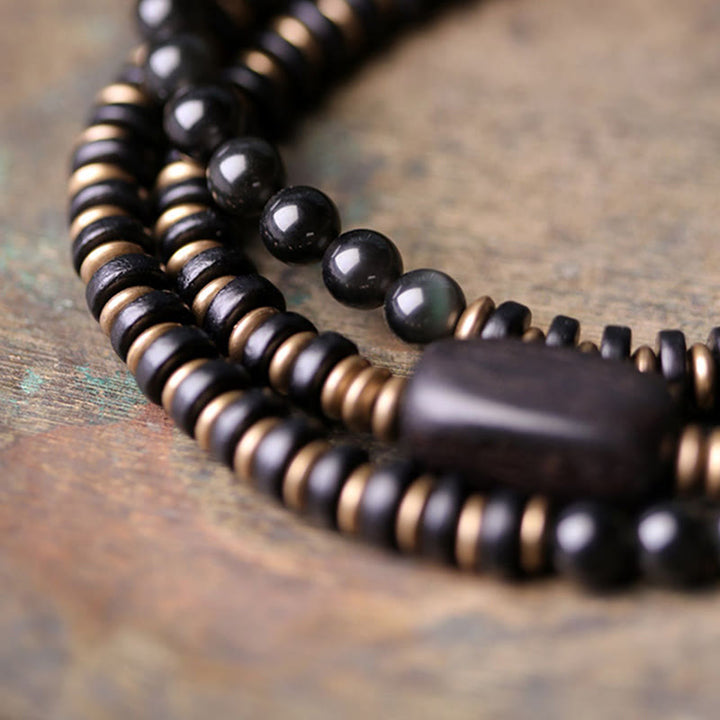 Pulsera de triple envoltura curativa de cobre y madera de ébano, obsidiana arcoíris con Buddha Stones