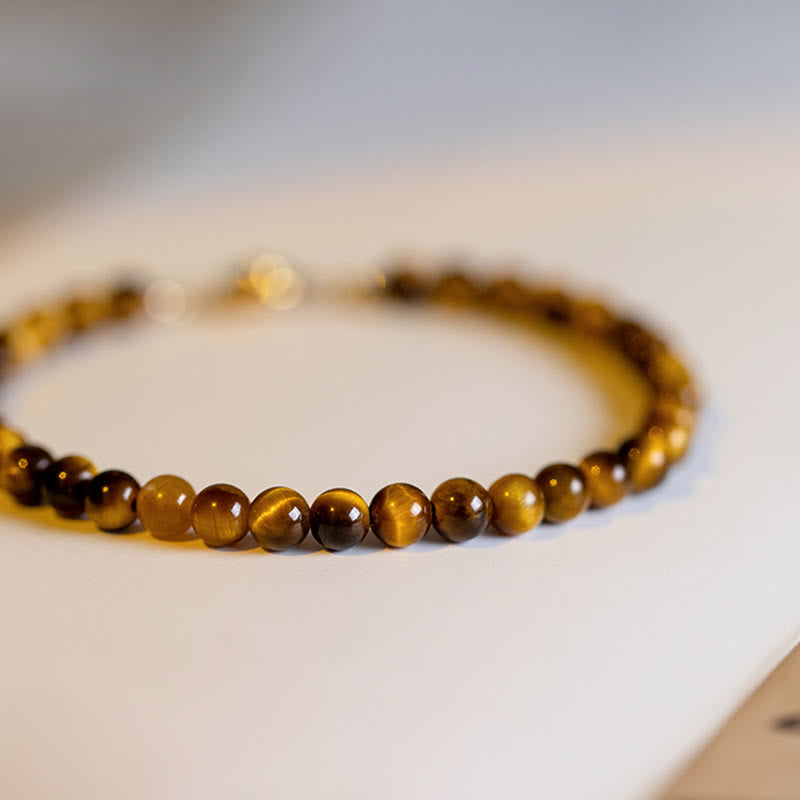 Buddha Stones Pulsera de protección de coraje con piedra de ojo de tigre natural chapada en oro de 14 quilates
