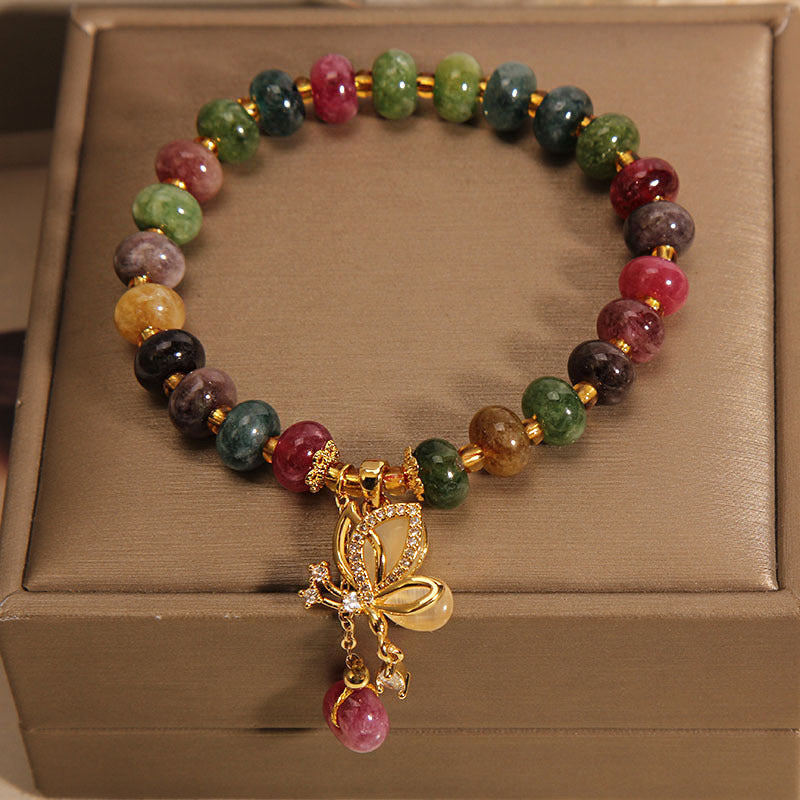 Pulsera de sabiduría con dije de mariposa y turmalina colorida con Buddha Stones