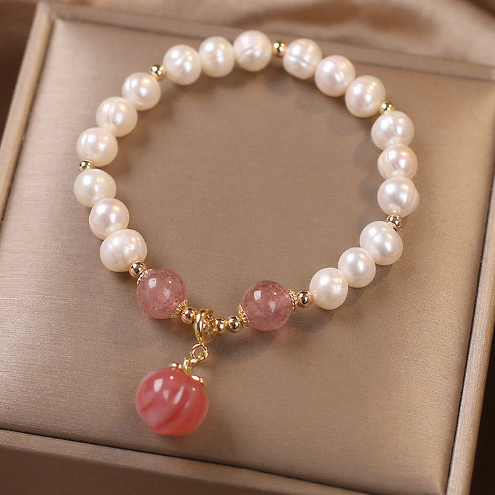 Pulsera con dije de sabiduría de corazón de amor de melocotón de cuarzo de fresa de perlas naturales de Buddha Stones