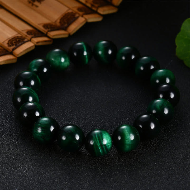 Pulsera de fuerza de ojo de tigre verde natural con Buddha Stones - image 4
