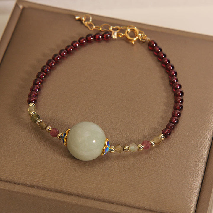 Pulsera de protección con hebilla de paz con cuentas de jade granate y Buddha Stones