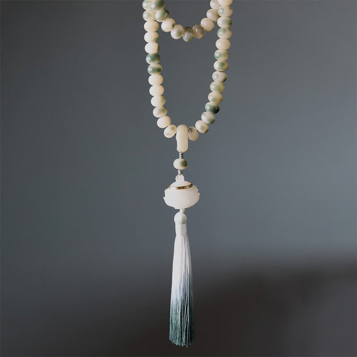Buddha Stones Natural 108 cuentas Mala semilla Bodhi loto grabado sabiduría borla pulsera