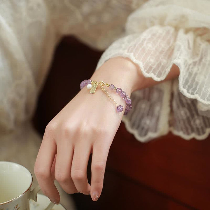 Pulsera de cristal de amatista natural que alivia el estrés.