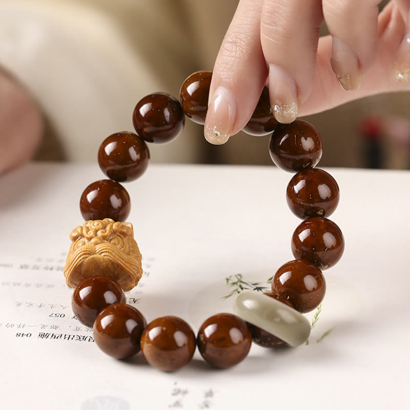 Pulsera de sabiduría de león danzante con semillas de Bodhi moradas con Buddha Stones
