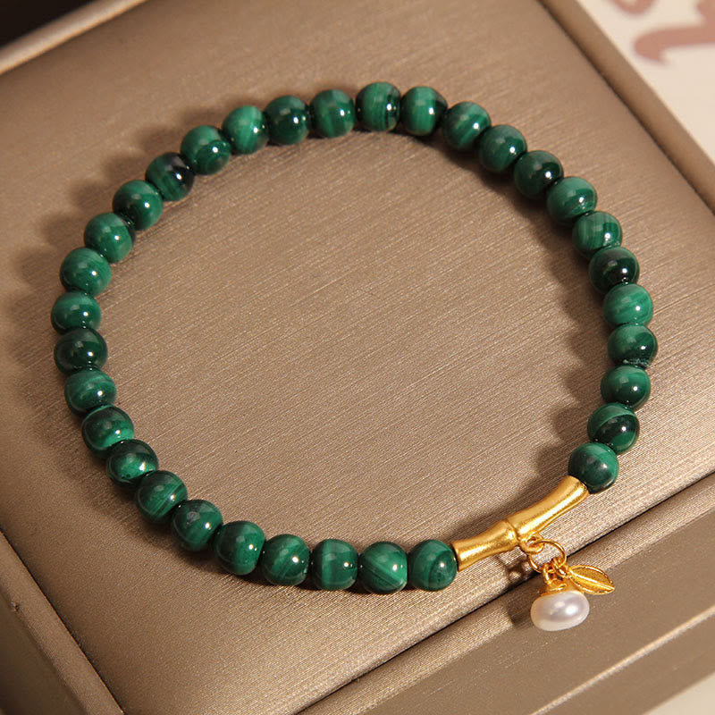 Pulsera antiansiedad de bambú de la suerte con perlas de malaquita natural de Buddha Stones