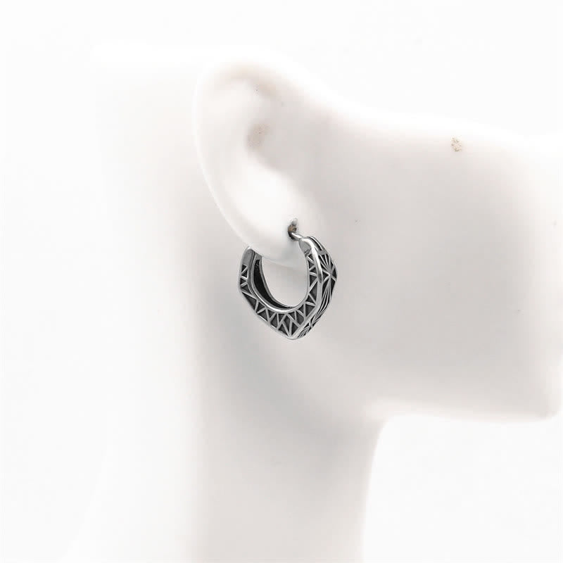 Pendientes de equilibrio de acero y titanio con aro vikingo - image 3