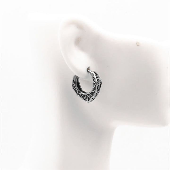 Pendientes de equilibrio de acero y titanio con aro vikingo - image 3
