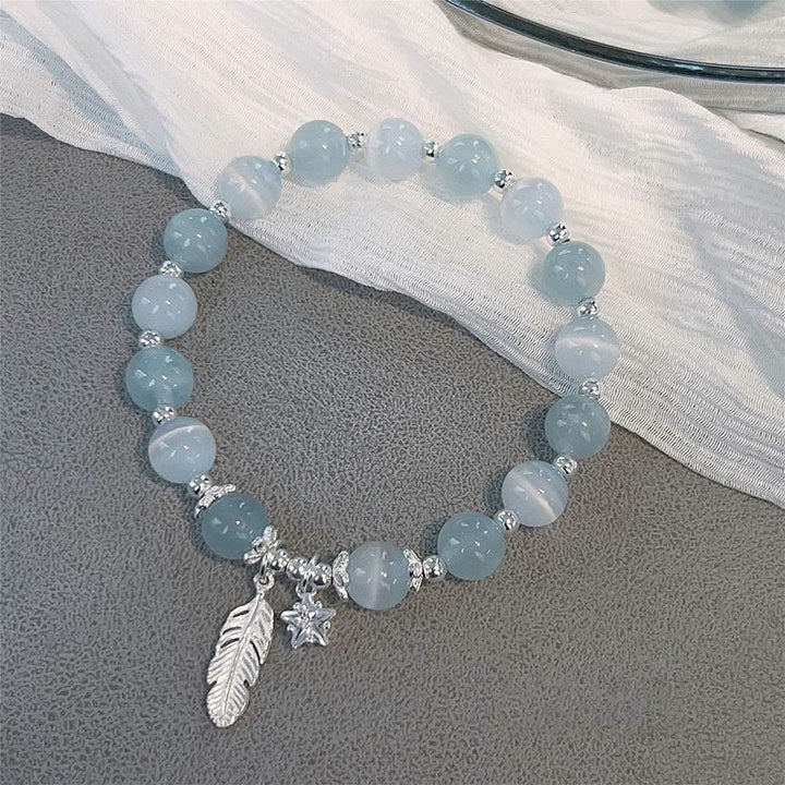 Pulsera con dije de estrella y plumas curativas de ojo de gato, aguamarina, plata de ley 925 con Buddha Stones