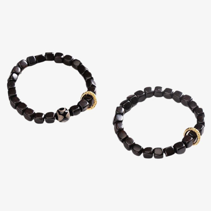Pulsera de equilibrio de cuentas Dzi de madera de ébano tibetano con Buddha Stones
