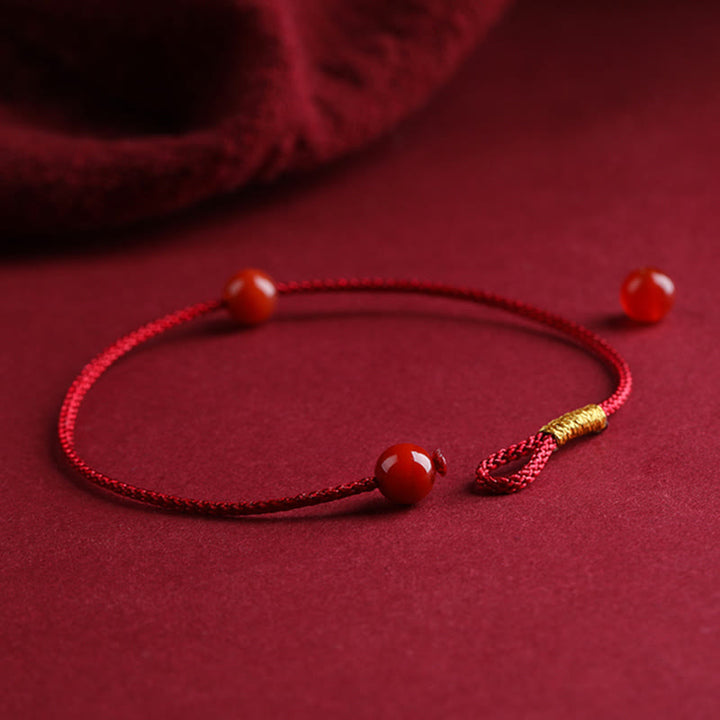 Pulsera de hilo rojo con bendición de ágata roja cinabrio natural con Buddha Stones