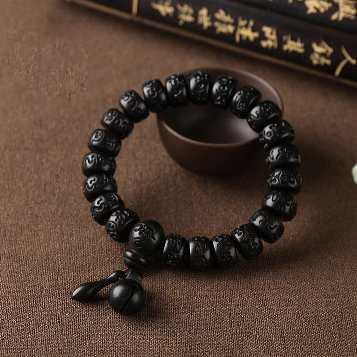 Pulsera de protección de madera con relámpago tibetano de Buddha Stones
