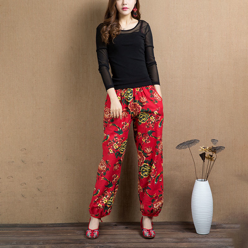 Pantalones bombachos con estampado de flores rojas y verdes de estilo étnico con Buddha Stones y bolsillos