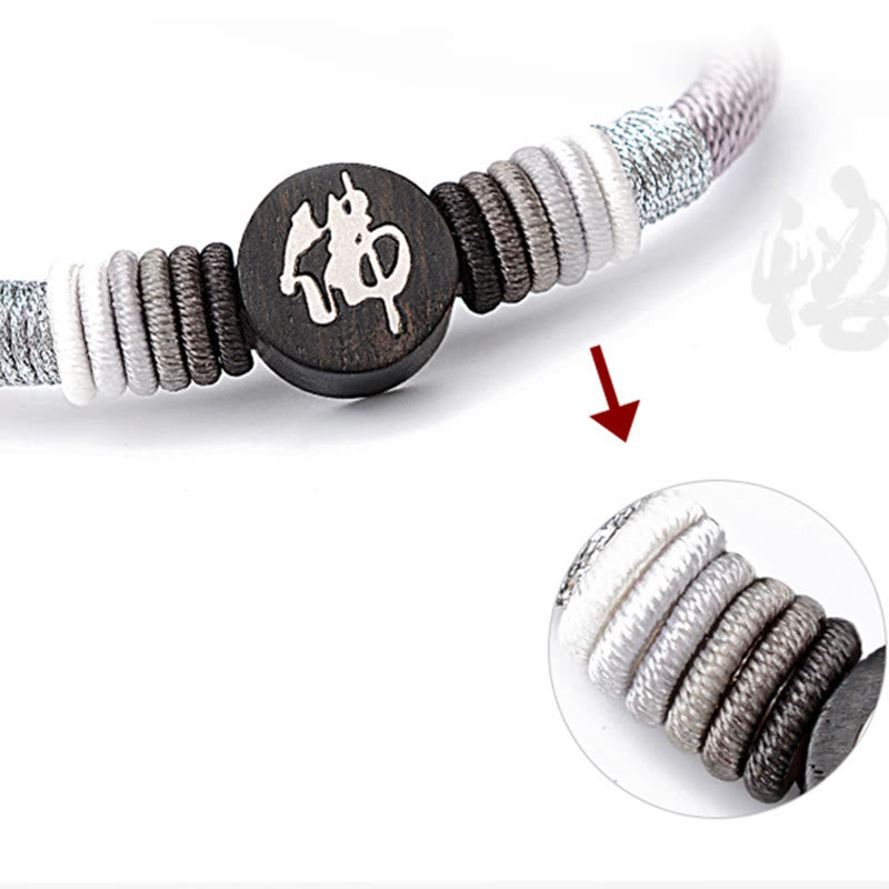 Pulsera de cuerda hecha a mano de ébano con personaje de Buda de Buddha Stones