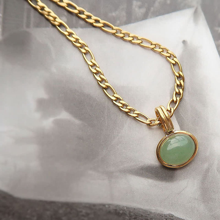 Colgante de collar de acero de titanio de fuerza turquesa ovalada