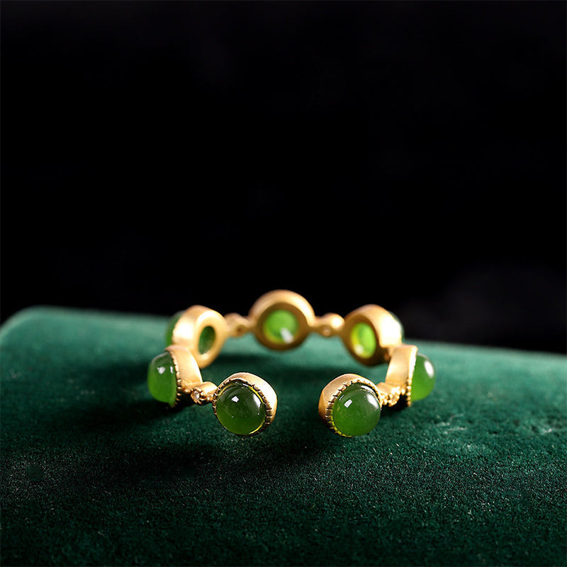 Anillo ajustable calmante curativo de jade cian con Buddha Stones