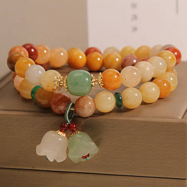 Pulsera de la suerte de orquídeas con campana de doble capa de Jade de seda dorada Natural del Tíbet con Buddha Stones