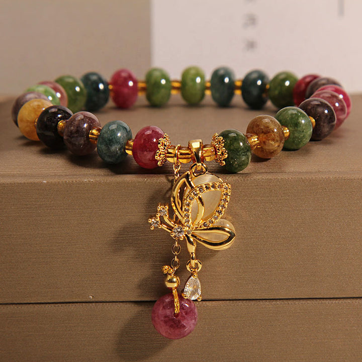 Pulsera de sabiduría con dije de mariposa y turmalina colorida con Buddha Stones