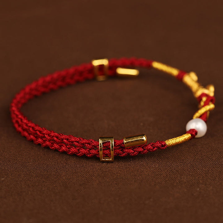 Pulsera trenzada de la suerte con perlas de conejo y mango de Ruyi del deseo de oro de 24 quilates con Buddha Stones