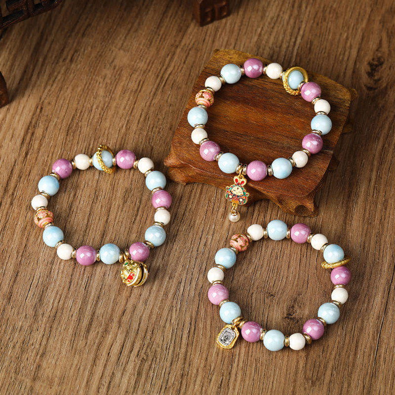 Buddha Stones tibetano Zakiram diosa de la riqueza conejo cabeza de león encanto Liuli vidrio incienso ceniza porcelana cuentas pulsera de protección