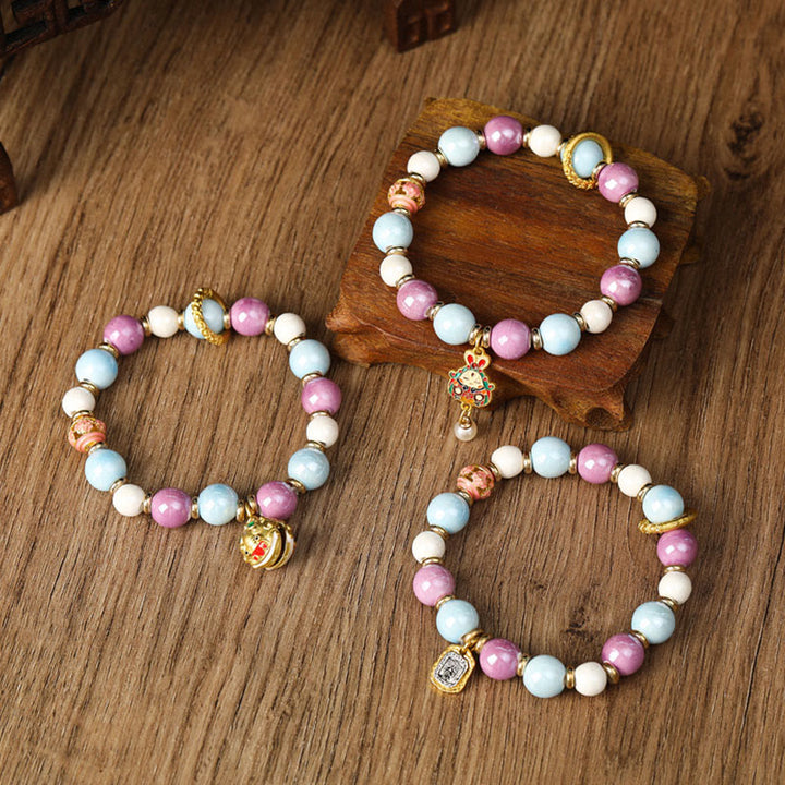 Buddha Stones tibetano Zakiram diosa de la riqueza conejo cabeza de león encanto Liuli vidrio incienso ceniza porcelana cuentas pulsera de protección
