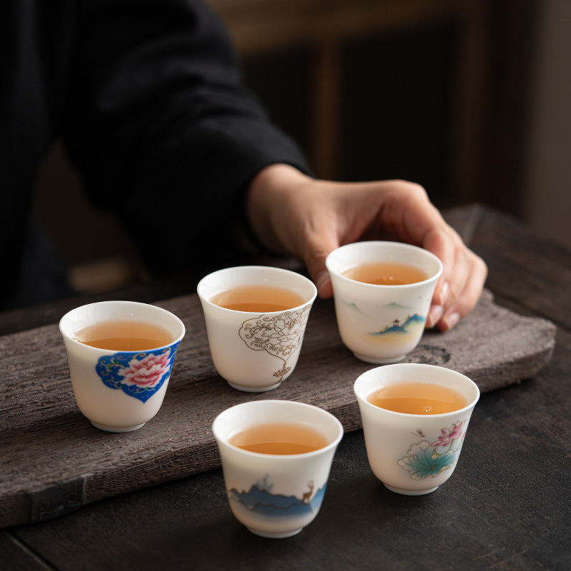 Taza de té de cerámica con Buddha Stones, flor de loto, hoja, montaña, pabellón, alce, peonía, taza de té de Kung Fu
